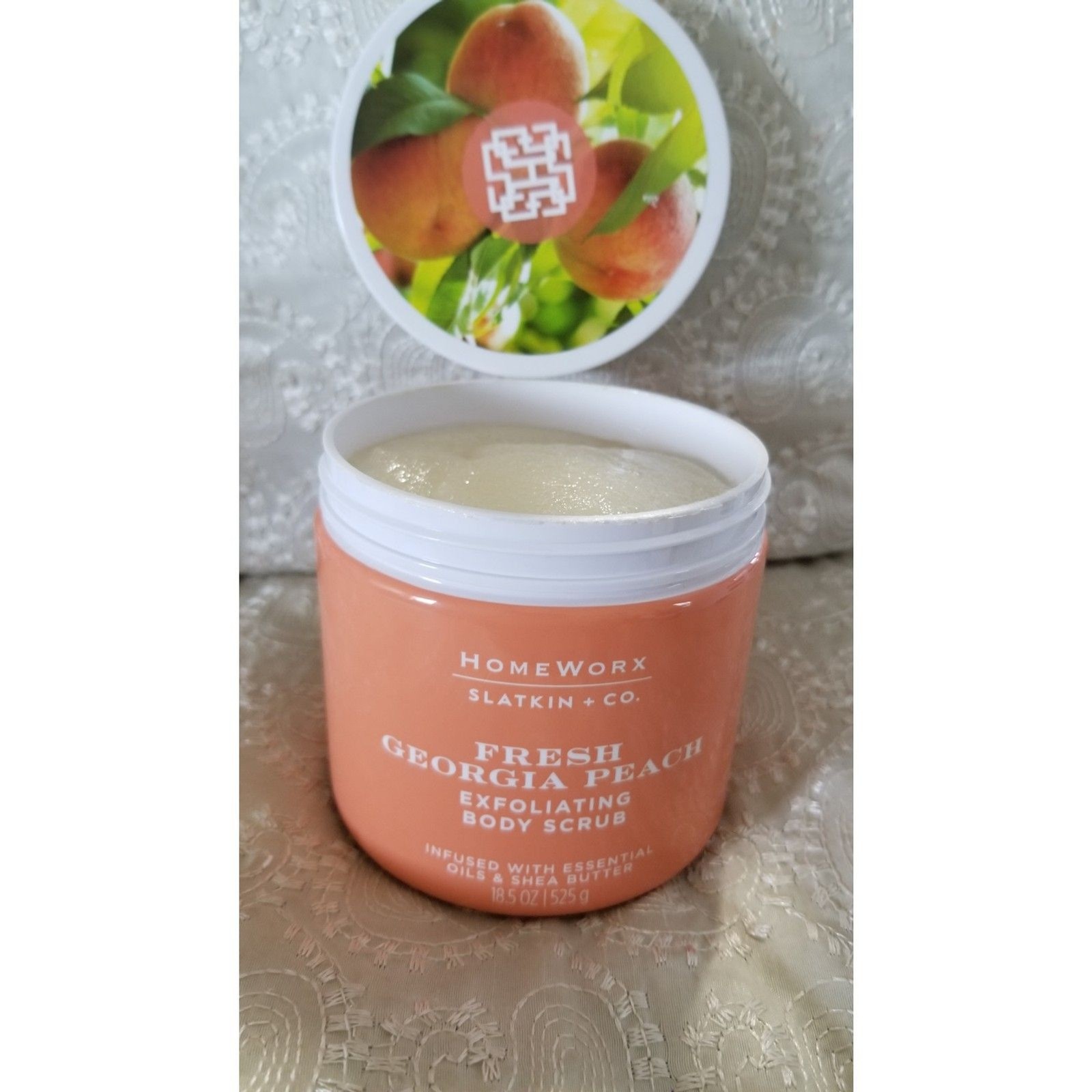 The Homeworx Fresh Georgia Peach Body Scrub by Slatkin + Co. is a, 18.5-oz